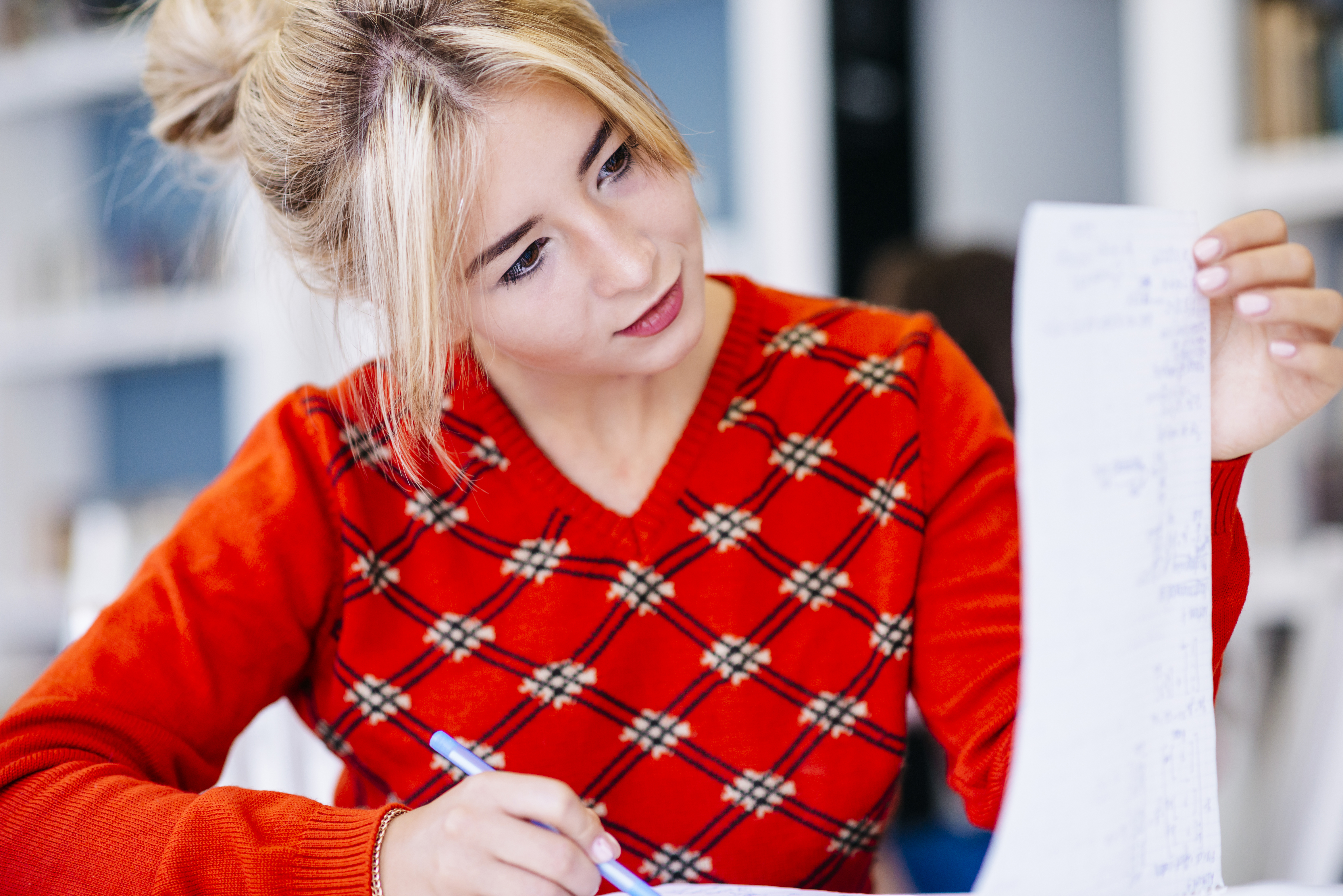 young-woman-reading-notes